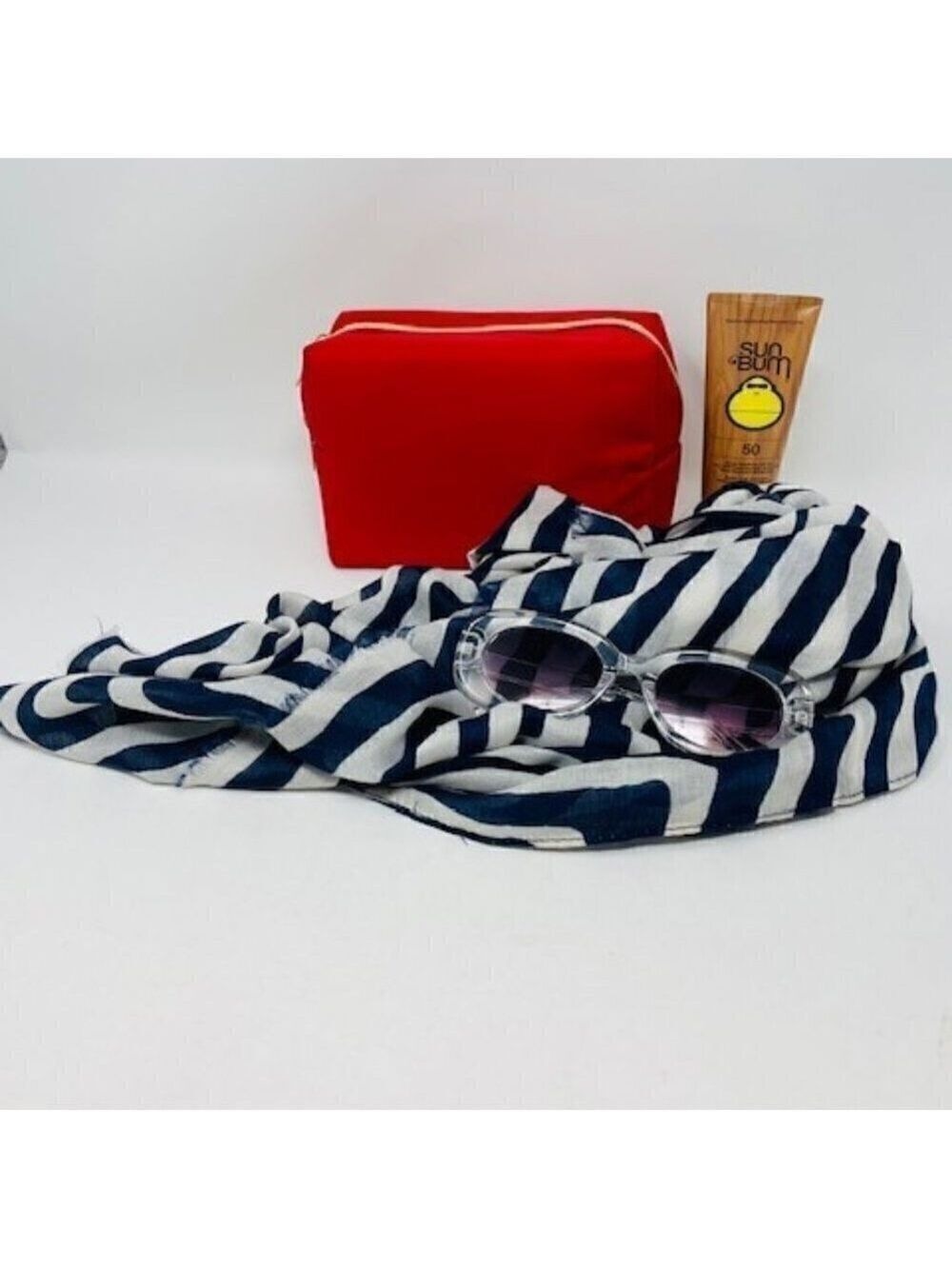 4 piece bag, scarf, sunglass and suncreen set